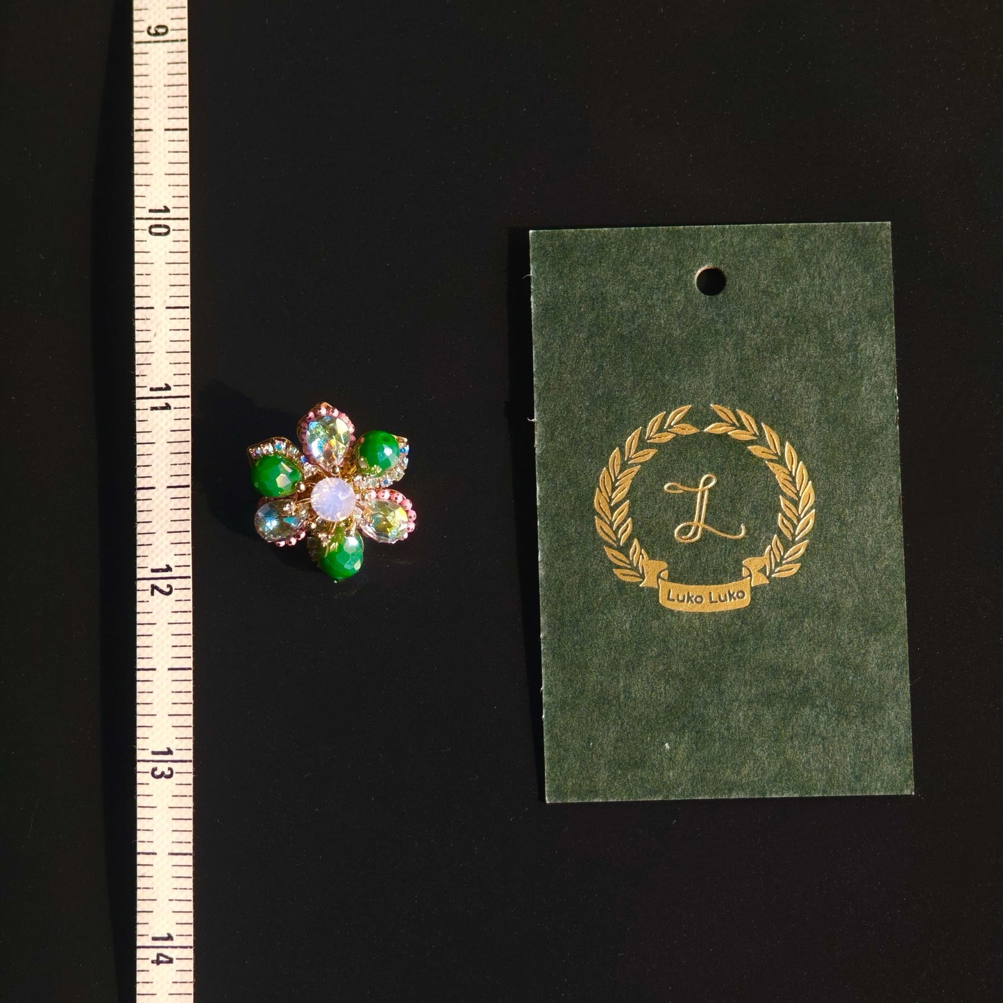 Celeste Bloom – Multicolor Crystal Flower Brooch | Radiant Contrast with Black Couture